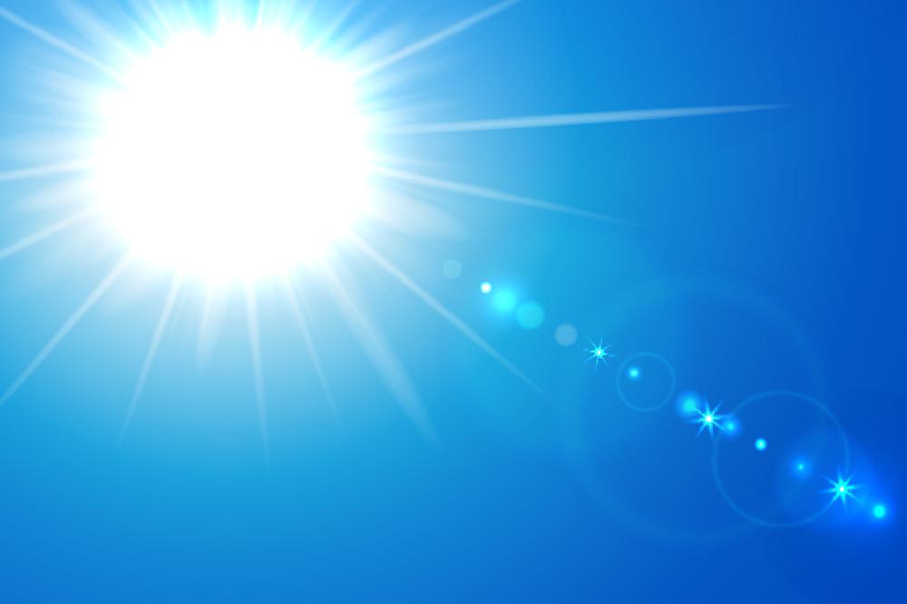 A blazing sun in a blue sky to help illustrate how much heat do windows let in.