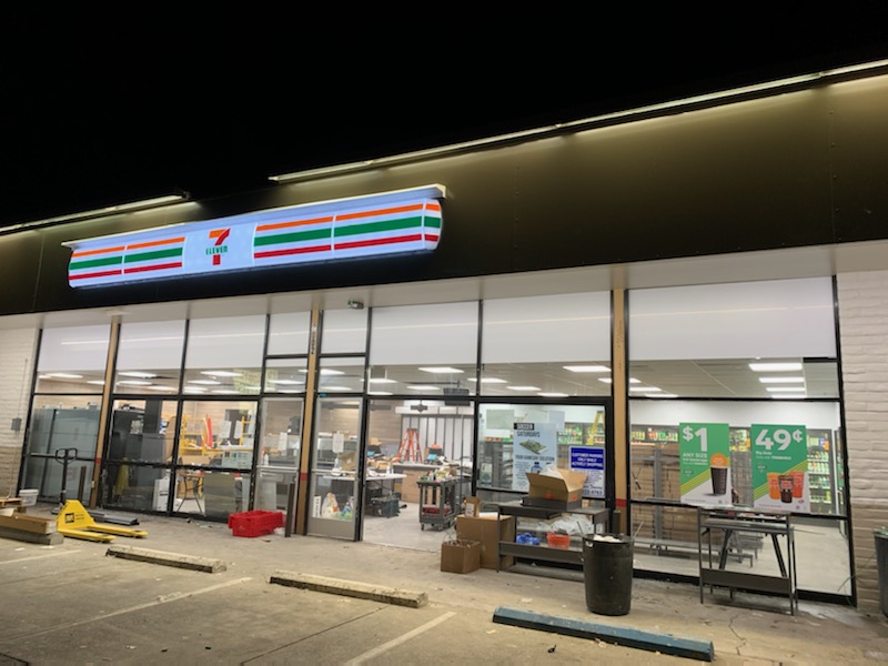 Image of the front of a 7-11 store at night