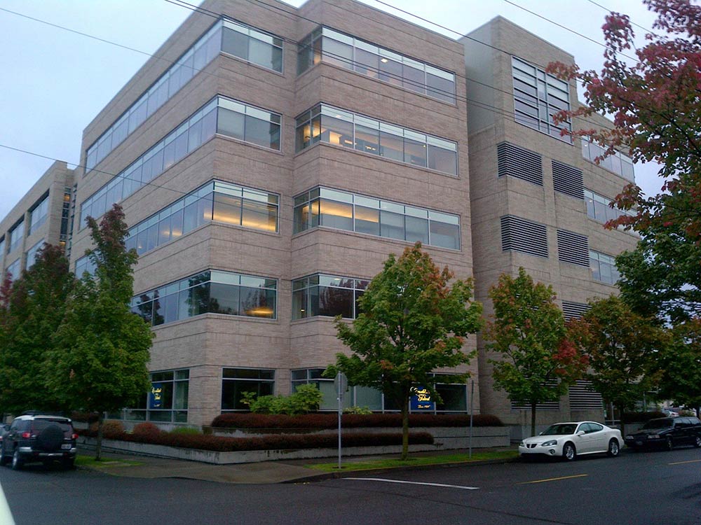 A 5-story office building at dusk