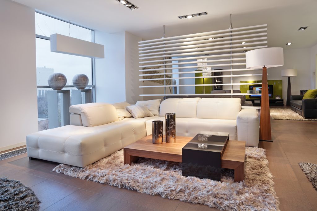 Modern living room with large windows and lots of natural light